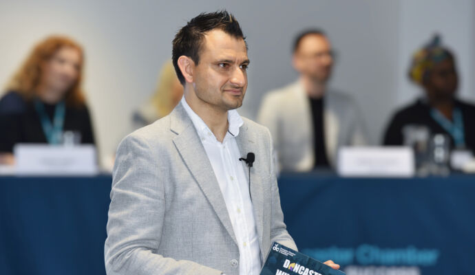 Tariq Shah, pictured hosting the recent Doncaster Business Conference, has been awarded an OBE in the Queen’s Platinum Jubilee honours